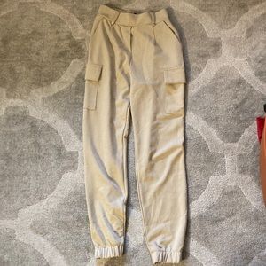 Cream colour skinny fit cargos. Bought from stitches. Size small.